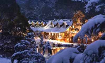Snow lodge peering through
