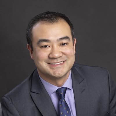 Professional Headshot of Eddie Izumizaki